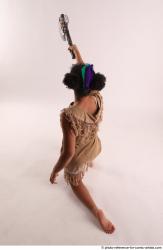 ANISE KNEELING POSE WITH AX 